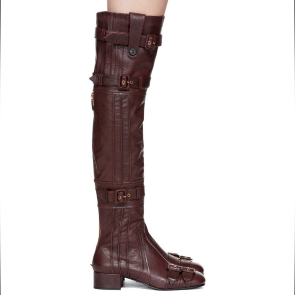 Prada buckle over the knee boots in Very Good condition. Only worn a few times